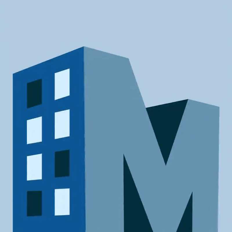 En blå og hvid bygning med bogstavet m.